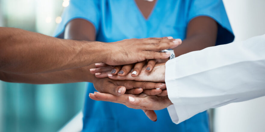 Medical, team support and diversity hands of hospital nurse, doctor and surgeon stack together for .